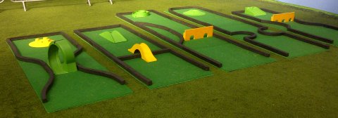 Crazy Golf Course for Hire. A range of crazy golf holes including loop the loop, bridges, tunnels, spirals and more. Perfect putting fun for events indoors or outside