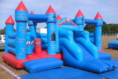 Bouncy Castle with Slide and Biff Bash tubes for hire Lichfield and the surrounding area