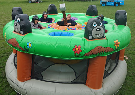 Inflatable bouncy Human Whack a Mole game for hire